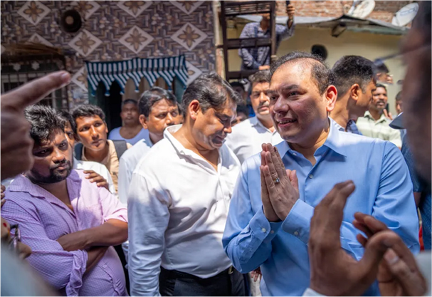 Pranav Adani with Dharavi residents